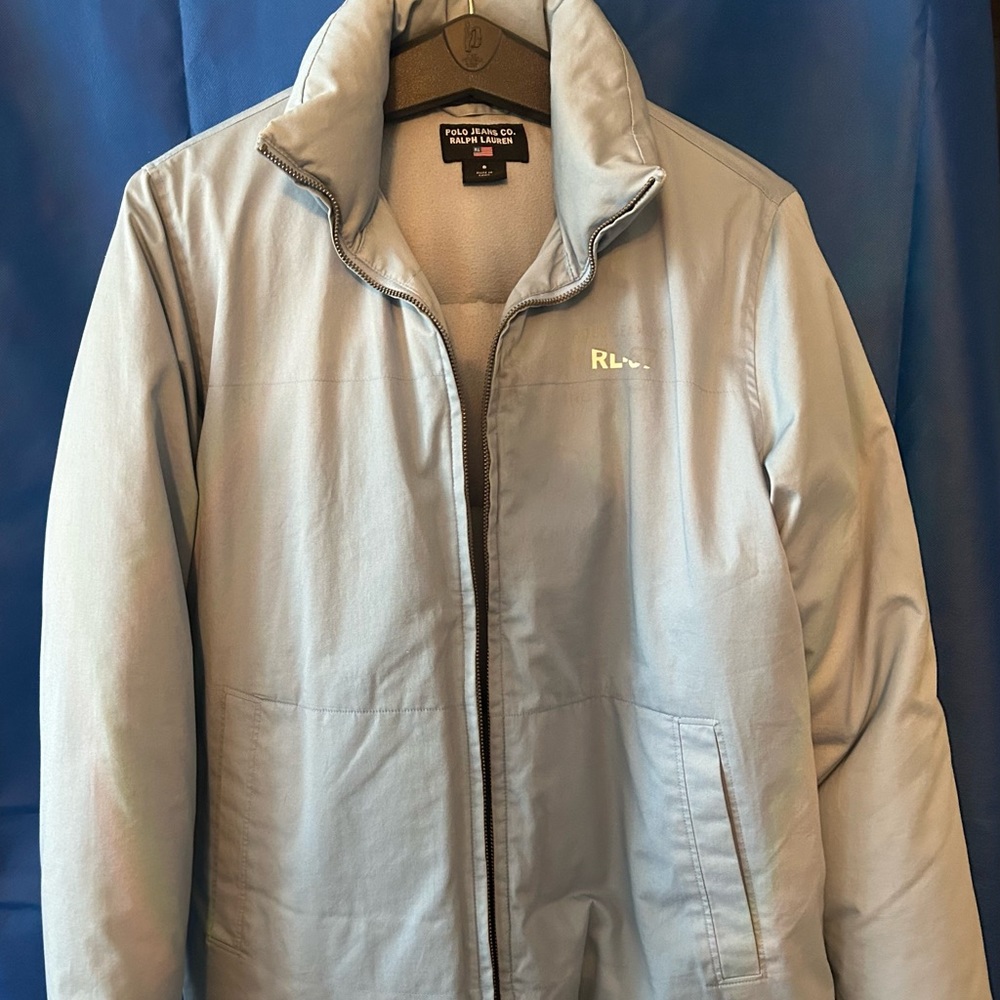 Slightly used. Worn twice. Light Blue, w/ heavy lining great for the winter.